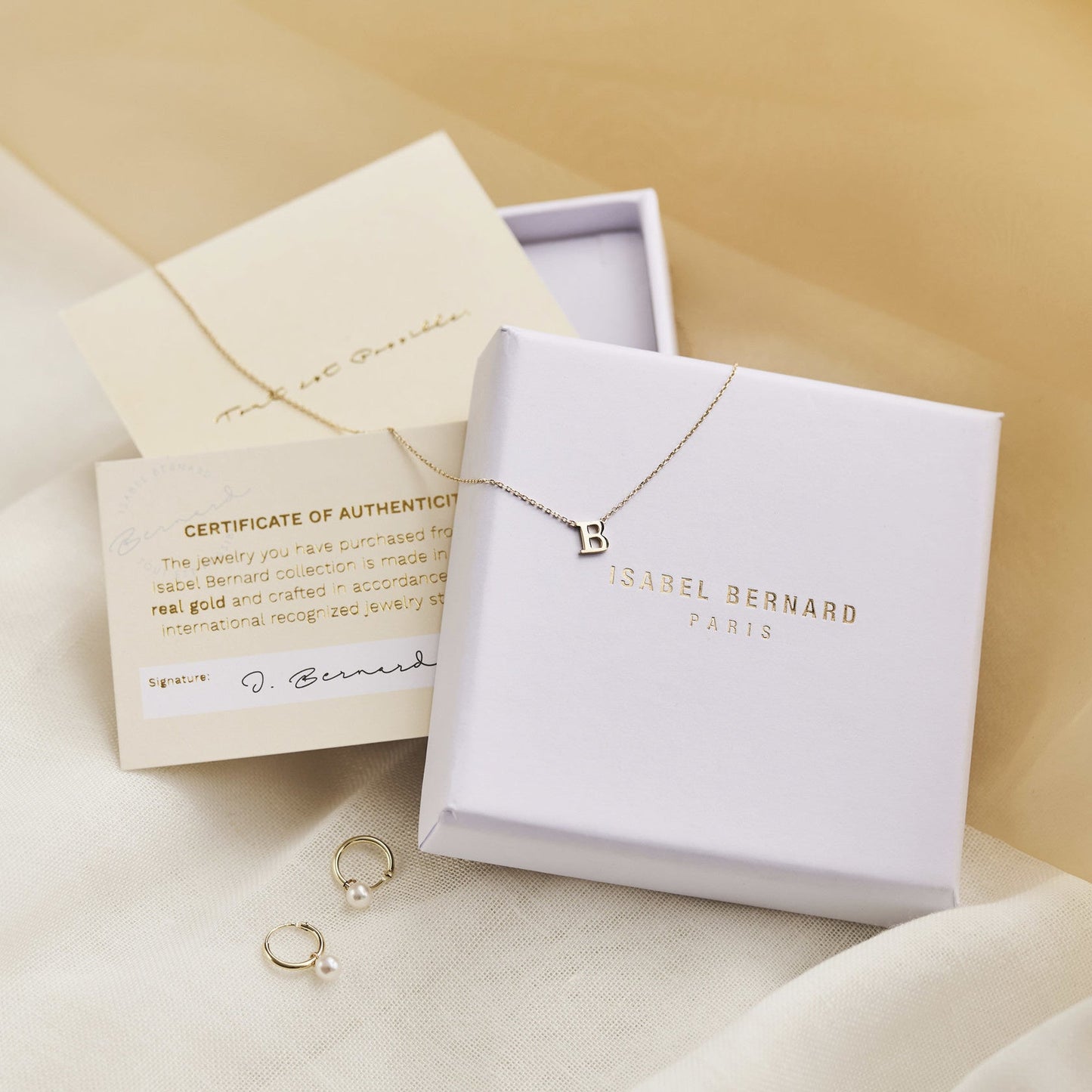 Alice 14 karat gold necklace with 2 rods