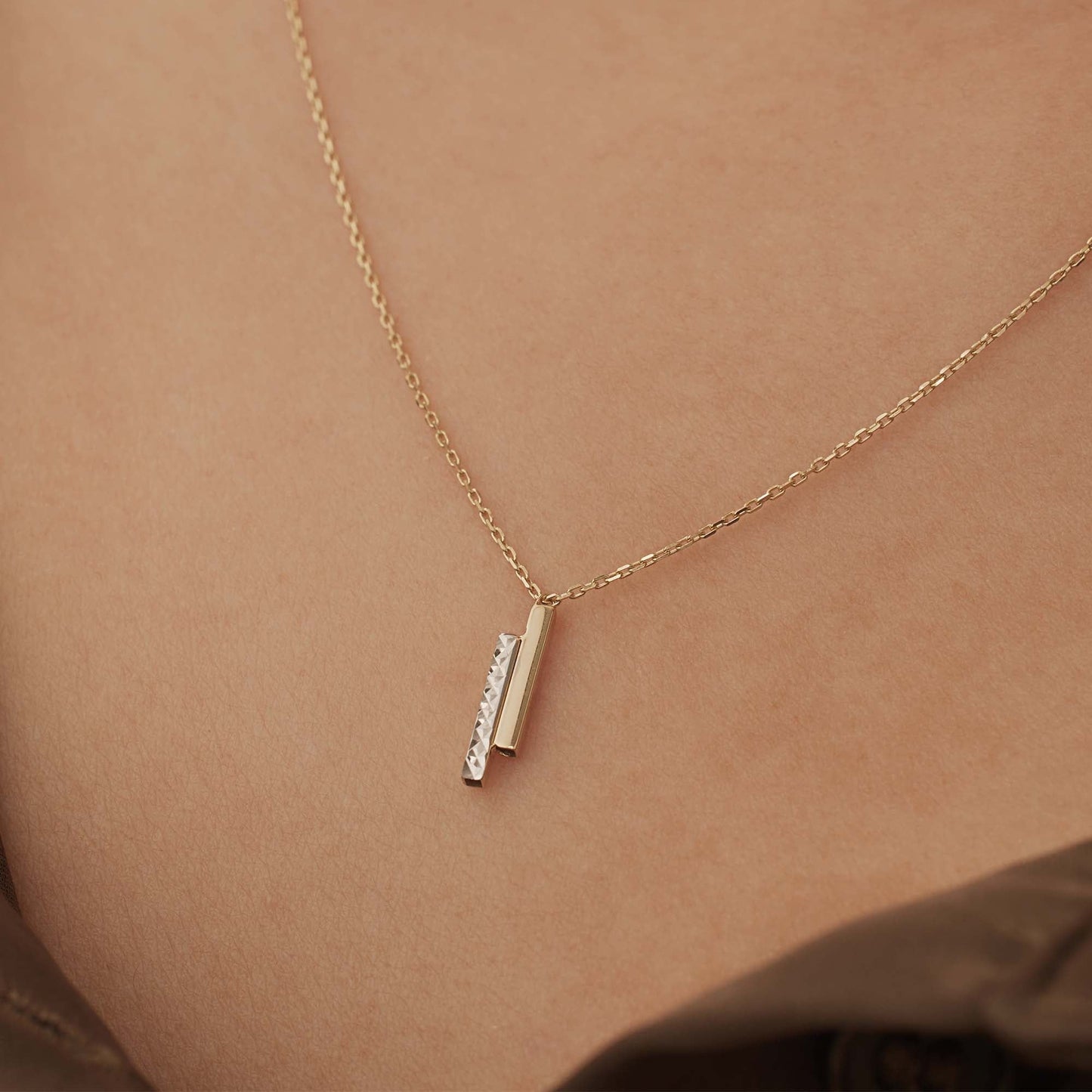Alice 14 karat gold necklace with 2 rods
