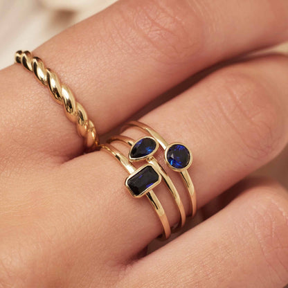 Baguette Nila 14 karat gold ring with blue zirconia stone